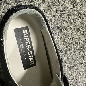 Black Golden Goose tennis shoes size 9.  Like new worn once